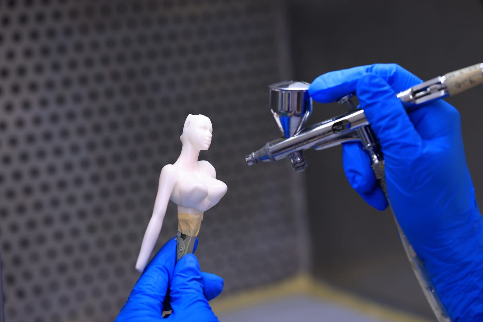 Hand-painted model parts in production